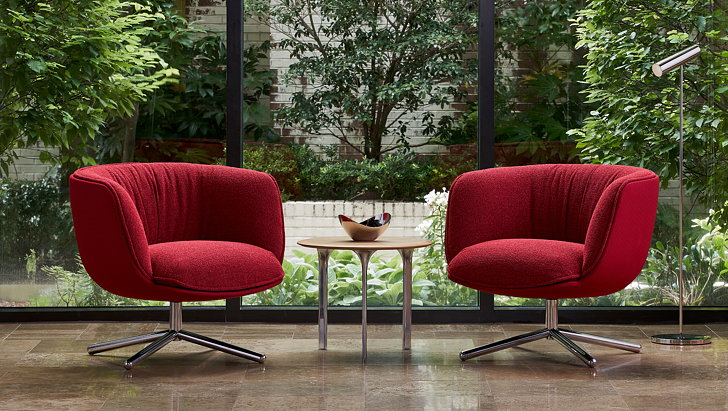 形状类似于甜甜圈的毛绒桶形休闲椅