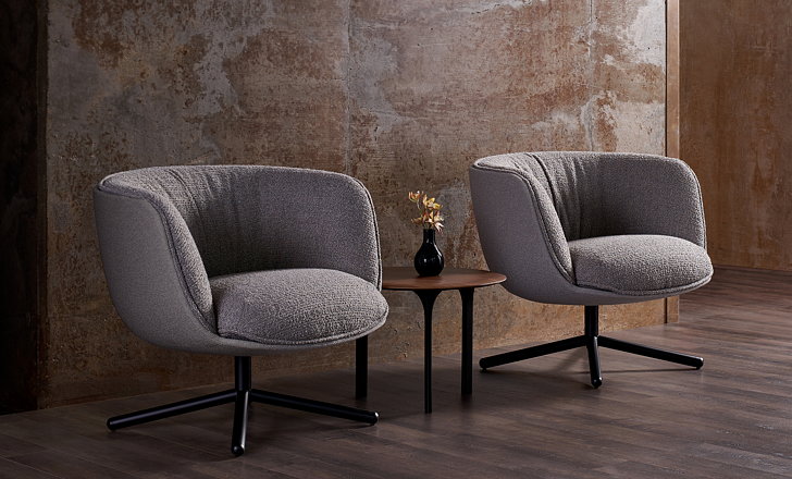 形状类似于甜甜圈的毛绒桶形休闲椅