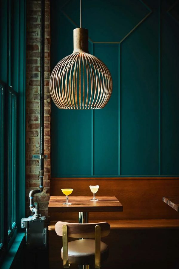 Heliotrope Architects在西雅图设计了Rupee Bar餐厅